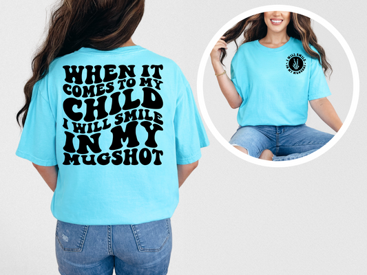 When it comes to my child I will smile in my mugshot (back)