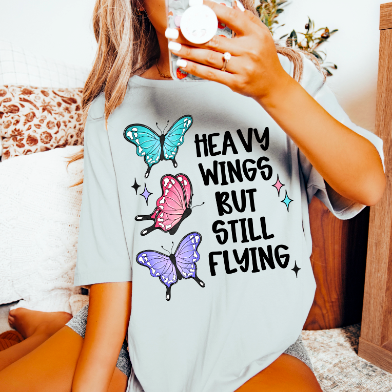 Heavy wings but still flying